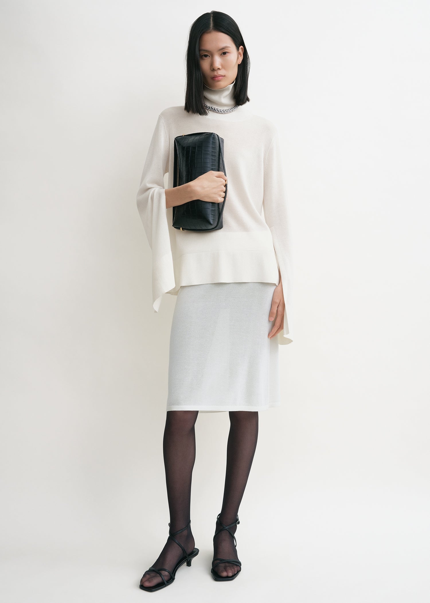 Slit sleeve turtleneck white
