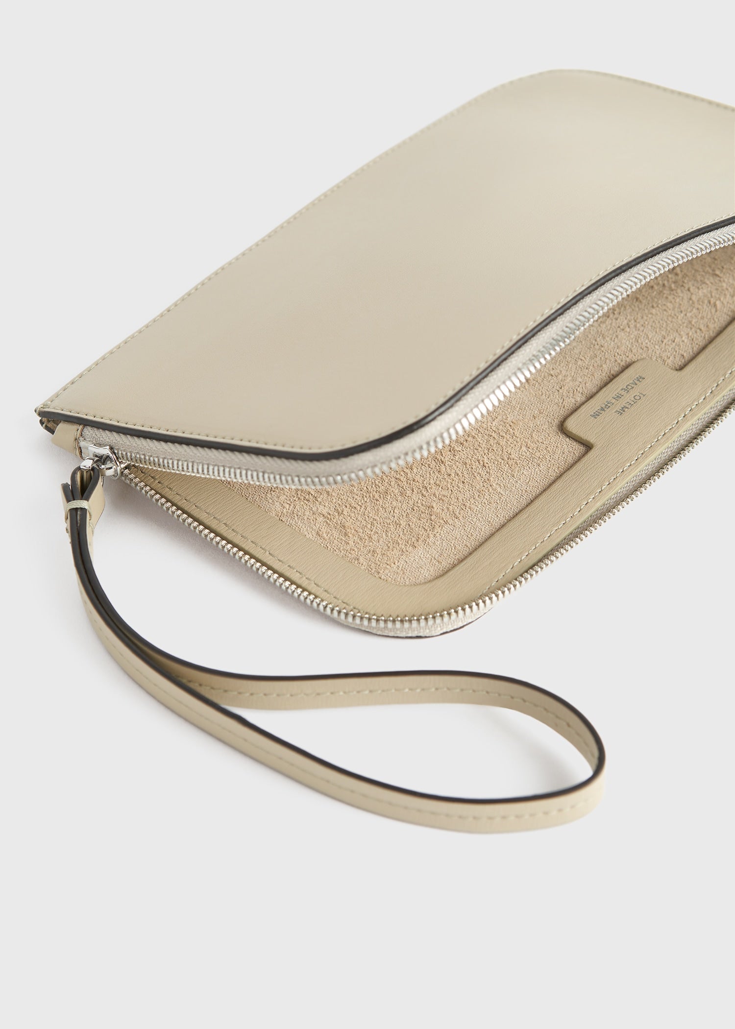Monogram leather wristlet pouch fawn 6 Monogram leather wristlet pouch fawn